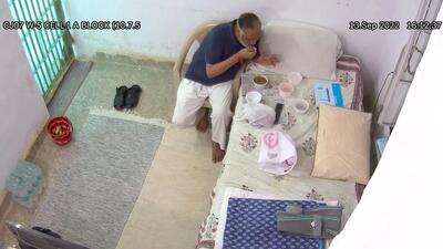 CCTV footage from Tihar jail shows Satyendar Jain eating a prepared meal. (ANI) CCTV footage from Tihar jail shows Satyendar Jain eating a prepared meal. (ANI)