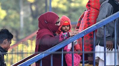 New Delhi, India - Nov. 23, 2022: People are seen wearing warm clothes on a cold winter morning at Tilak Bridge railway station in New Delhi, India, on Wednesday, November 23, 2022. (Photo by Arvind Yadav/ Hindustan Times) (Hindustan Times)