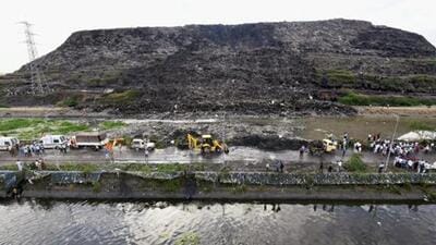 Dubbed ‘the tallest mountain of waste’ in the country, with its height often compared to Qutub Minar, the Ghazipur landfill — 65 metres tall, compared to the Qutub’s 73 metres in 2019 — that holds more than 14 million tonnes of legacy waste was the launchpad for AAP’s political campaign for the MCD elections. (PTI) Dubbed ‘the tallest mountain of waste’ in the country, with its height often compared to Qutub Minar, the Ghazipur landfill — 65 metres tall, compared to the Qutub’s 73 metres in 2019 — that holds more than 14 million tonnes of legacy waste was the launchpad for AAP’s political campaign for the MCD elections. (PTI)