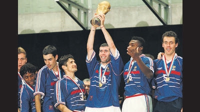 Zinedine Zidane with the trophy after France won the 1998 World Cup. (Getty Images)