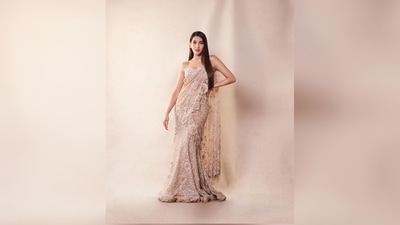 Nora Fatehi paired her saree with a matching strappy blouse and diamond jewellery. (Instagram/@norafatehi)