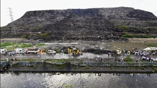 Dubbed ‘the tallest mountain of waste’ in the country, with its height often compared to Qutub Minar, the Ghazipur landfill — 65 metres tall, compared to the Qutub’s 73 metres in 2019 — that holds more than 14 million tonnes of legacy waste was the launchpad for AAP’s political campaign for the MCD elections. (PTI)