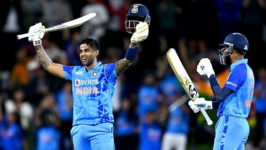 Suryakumar Yadav raises his bat after completing his century during the 2nd T20I against New Zealand(ICC Twitter)