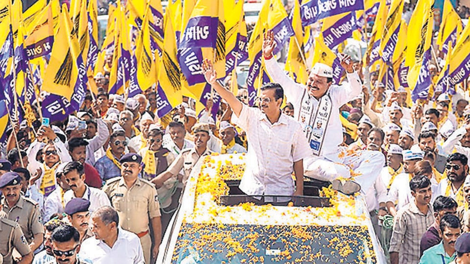 AAP convener Arvind Kejriwal during a roadshow in Gujarat’s Rajkot district on November 7. (PTI) AAP convener Arvind Kejriwal during a roadshow in Gujarat’s Rajkot district on November 7. (PTI)