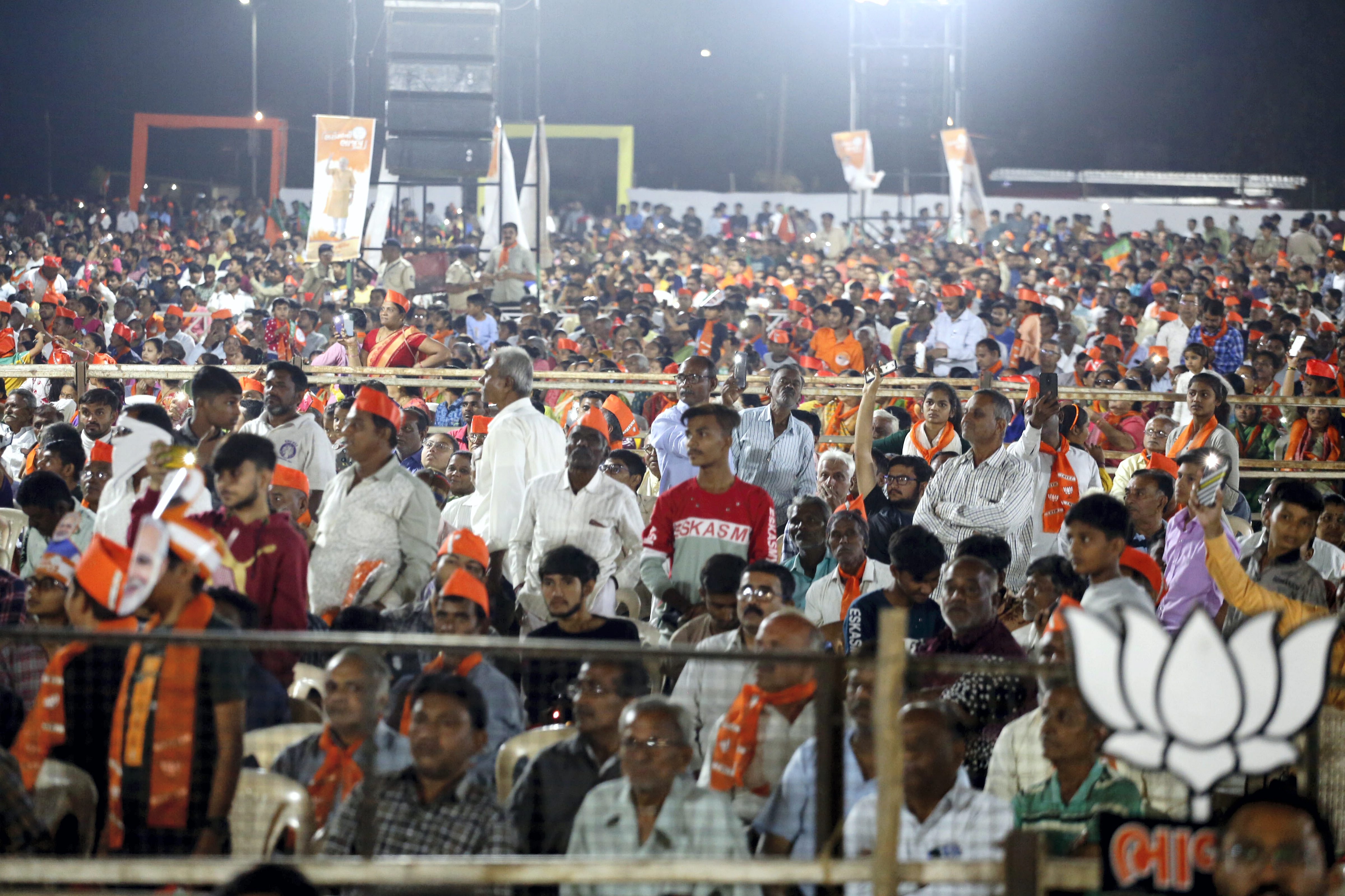 Supporters of Prime Minister Narendra Modi during a BJP public meeting ahead of Gujarat Assembly election in Bhavnagar. (PTI)