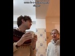 Mother and son singing together.