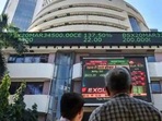 People watch the Sensex on a screen outside Bombay Stock Exchange (BSE) in Mumbai. (PTI File Photo) People watch the Sensex on a screen outside Bombay Stock Exchange (BSE) in Mumbai. (PTI File Photo)
