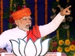 Prime Minister Narendra Modi addresses a public rally for the upcoming Gujarat Assembly elections, in Dahegam on Thursday.(ANI)