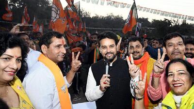 Union Minister for Youth Affairs and Sports Anurag Thakur at a roadshow in favour of Bharatiya Janata Party (BJP) candidate Jagmohan Mehlawat for the upcoming Municipal Corporation of Delhi (MCD) elections, at Vasant Kunj in New Delhi on Thursday. (Office of Anurag Thakur Twitter) Union Minister for Youth Affairs and Sports Anurag Thakur at a roadshow in favour of Bharatiya Janata Party (BJP) candidate Jagmohan Mehlawat for the upcoming Municipal Corporation of Delhi (MCD) elections, at Vasant Kunj in New Delhi on Thursday. (Office of Anurag Thakur Twitter)