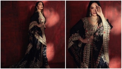 Madhuri Dixit, the 'dhak dhak' girl, once again set the internet ablaze with her jaw-dropping photos in a black embellished lehenga ser by one of India's most celebrated designers, Anamika Khanna. (Instagram/@madhuridixitnene) Madhuri Dixit, the 'dhak dhak' girl, once again set the internet ablaze with her jaw-dropping photos in a black embellished lehenga ser by one of India's most celebrated designers, Anamika Khanna. (Instagram/@madhuridixitnene)
