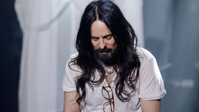 Designer Alessandro Michele acknowledges the applause of the audience at the end of Gucci's Fall/Winter 2020/2021 collection. (AP) Designer Alessandro Michele acknowledges the applause of the audience at the end of Gucci's Fall/Winter 2020/2021 collection. (AP)