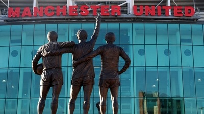 General view of the United Trinity statue outside Old Trafford (REUTERS)