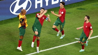 Cristiano Ronaldo celebrates scoring Portugal's first goal with teammates (REUTERS)