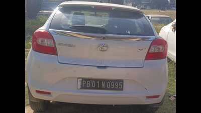 The Toyota Glanza car, which was snatched by the carjackers, near Purab Premium Apartments, Sector 88, Mohali, around 2:30am on Thursday. It was tracked down to Sirhind. (HT Photo) The Toyota Glanza car, which was snatched by the carjackers, near Purab Premium Apartments, Sector 88, Mohali, around 2:30am on Thursday. It was tracked down to Sirhind. (HT Photo)