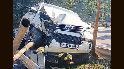 The mangled remains of the car in Sector 70 on Airport Road, Mohali. (HT Photo)