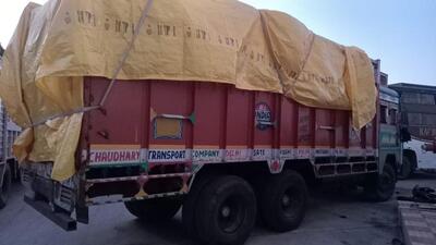A truck seized from Pataudi road on Thursday carrying 566 cases of Indian-made foreign liquor to Gujarat. (Parveen Kumar,/HT Photo) A truck seized from Pataudi road on Thursday carrying 566 cases of Indian-made foreign liquor to Gujarat. (Parveen Kumar,/HT Photo)
