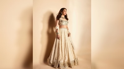 Madhuri Dixit teamed her modern lehenga set with an emerald green neckpiece. (Instagram/@madhuridixitnene) Madhuri Dixit teamed her modern lehenga set with an emerald green neckpiece. (Instagram/@madhuridixitnene)