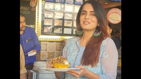 Ruhi relishing basket chaat in Lucknow.