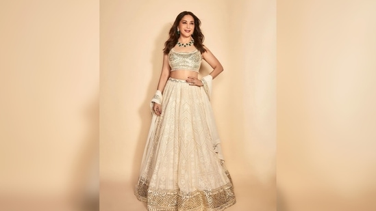 Madhuri Dixit's outfit comes with a sequins sleeveless blouse, a lehenga and a matching dupatta.(Instagram/@madhuridixitnene)