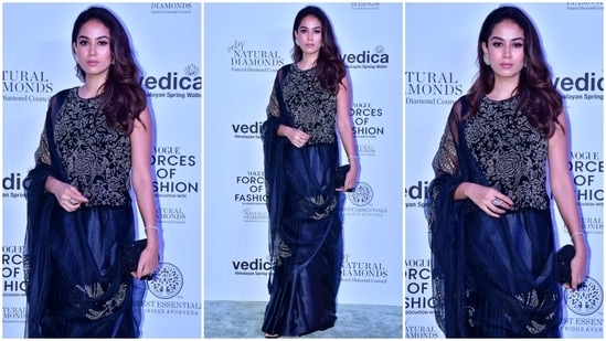 Mira Rajput wore a chiffon embellished saree and velvet embroidered blouse styled with sterling silver ear cuffs, matching rings, a sleek bracelet, high heels and a matching clutch. Open tresses and striking makeup rounded it all off.(HT Photo/Varinder Chawla)