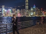 Hong Kong: A man talks on his phone in front of the skyline in Hong Kong.(AP File) Hong Kong: A man talks on his phone in front of the skyline in Hong Kong.(AP File)