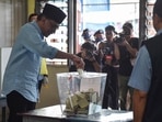 Malaysia Election: Malaysia's opposition leader Anwar Ibrahim, chairman of the Pakatan Harapan (Alliance of Hope), casts his ballot at a polling station during the general election in Permatang Pauh.(AFP) Malaysia Election: Malaysia's opposition leader Anwar Ibrahim, chairman of the Pakatan Harapan (Alliance of Hope), casts his ballot at a polling station during the general election in Permatang Pauh.(AFP)