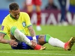 Brazil's Neymar grabs his ankle after an injury during the World Cup group G soccer match between Brazil and Serbia, at the the Lusail Stadium in Lusail, Qatar (AP) Brazil's Neymar grabs his ankle after an injury during the World Cup group G soccer match between Brazil and Serbia, at the the Lusail Stadium in Lusail, Qatar (AP)