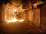 Flames and smoke billow out as fire broke out in the shops of Bhagirath Palace market of Chandni Chowk, in old Delhi on Thursday.(ANI) Flames and smoke billow out as fire broke out in the shops of Bhagirath Palace market of Chandni Chowk, in old Delhi on Thursday.(ANI)