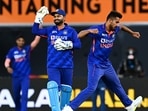 Umran Malik and Rishabh Pant celebrate the wicket of New Zealand's Devon Conway Umran Malik and Rishabh Pant celebrate the wicket of New Zealand's Devon Conway