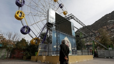 Afghanistan: An Afghan man stands in an amusement park in Kabul, Afghanistan. (Reuters)