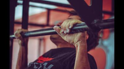 The 100 Repetition program involves doing 100 reps of push ups, pull ups, squats and crunches