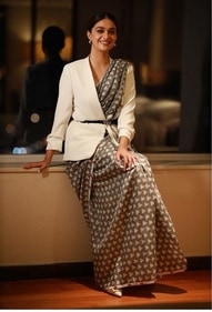 To pull off the look, pair the saree with blazers and white peep-toe kitten heels. (pinterest) To pull off the look, pair the saree with blazers and white peep-toe kitten heels. (pinterest)