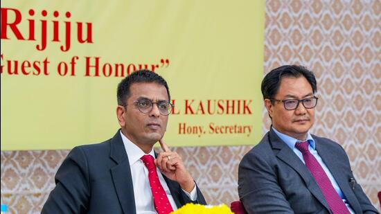 Chief Justice of India (CJI) Justice D.Y Chandrachud with Union Law Minister Kiren Rijiju during a programme as part of Constitution Day celebrations, in New Delhi, Friday, Nov. 25, 2022. (PTI)