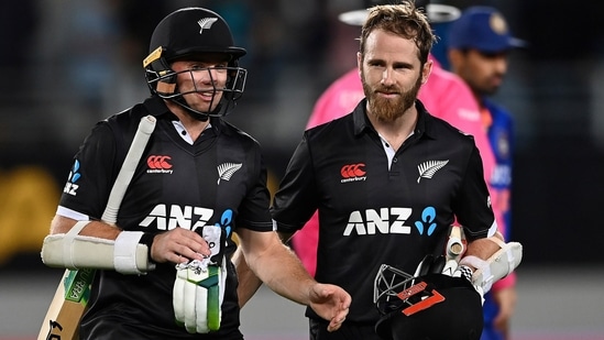 New Zealand's Tom Latham, left, and Kane Williamson walk off after their win over India in their one day international cricket match in Auckland, New Zealand, Friday, Nov. 25, 2022.(AP)