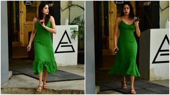 Ditching gym clothes, Janhvi switched up her after-workout look with a pretty solid green-coloured midi dress. She styled it in a minimal aesthetic, staying true to the casual outing vibes.(HT Photo/Varinder Chawla)