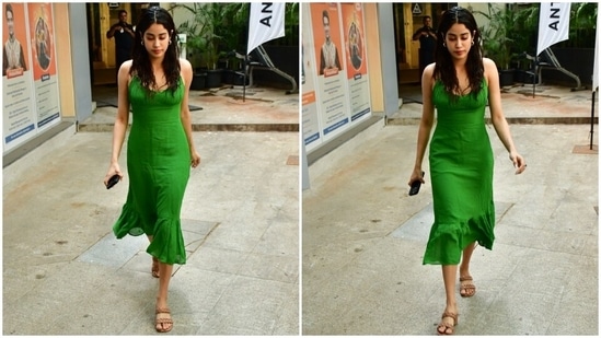 Janhvi teamed the green dress with gold hoop earrings, patterned strapped tan-coloured block heels, and an emerald-adorned ring.(HT Photo/Varinder Chawla)