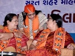 Union minister Smriti Irani with Union minister of state for railways and textiles Darshana Jardosh attends Mahila Sammelan, in Surat on Friday. (ANI) Union minister Smriti Irani with Union minister of state for railways and textiles Darshana Jardosh attends Mahila Sammelan, in Surat on Friday. (ANI)