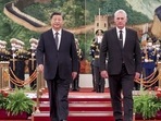 Chinese President Xi Jinping and Cuba's President Miguel Diaz-Canel Bermudez walk during a welcome ceremony. Chinese President Xi Jinping and Cuba's President Miguel Diaz-Canel Bermudez walk during a welcome ceremony.