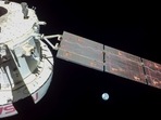 NASA's Orion spacecraft captured looking back at the Earth from a camera mounted on one of its solar arrays. NASA's Orion capsule is now circling the moon in an orbit stretching tens of thousands of miles. (AP/ NASA)