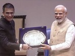 Prime Minister Narendra Modi being presented a memento by CJI DY Chandrachud during the Constitution Day celebrations in New Delhi on Saturday.(PTI) Prime Minister Narendra Modi being presented a memento by CJI DY Chandrachud during the Constitution Day celebrations in New Delhi on Saturday.(PTI)
