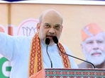 Union home minister Amit Shah addresses a public meeting for the upcoming Gujarat assembly elections in Vagra on Friday. (Amit Shah/Twitter)(HT_PRINT) Union home minister Amit Shah addresses a public meeting for the upcoming Gujarat assembly elections in Vagra on Friday. (Amit Shah/Twitter)(HT_PRINT)