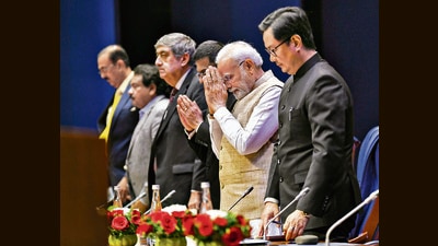 Prime Minister Narendra Modi with law minister Kiren Rijiju in New Delhi on Saturday. (PTI) Prime Minister Narendra Modi with law minister Kiren Rijiju in New Delhi on Saturday. (PTI)