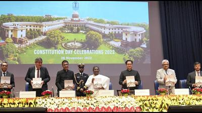 **EDS: IMAGE VIA PRESIDENT OFFICE** New Delhi: President Droupadi Murmu with Chief Justice of India (CJI) Justice D.Y. Chandrachud, Union Law and Justice Minister Kiren Rijiju and others during the Constitution Day celebrations organised by the Supreme Court, in New Delhi, Saturday, Nov. 26, 2022. (PTI Photo)(PTI11_26_2022_000314A) (PTI) **EDS: IMAGE VIA PRESIDENT OFFICE** New Delhi: President Droupadi Murmu with Chief Justice of India (CJI) Justice D.Y. Chandrachud, Union Law and Justice Minister Kiren Rijiju and others during the Constitution Day celebrations organised by the Supreme Court, in New Delhi, Saturday, Nov. 26, 2022. (PTI Photo)(PTI11_26_2022_000314A) (PTI)