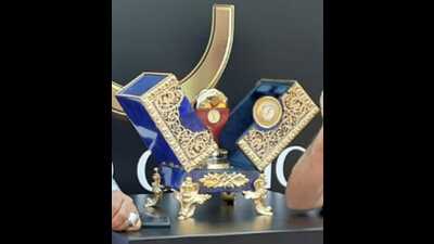 “The trophies were crafted from natural semi-precious stone – Natural Lapis Lazuli Gemstone. It has bronze work on it, and plating of 24 carat gold has been done on it. Although the weight of a gift box is about 15 kg, it took us almost three months to make them,” the Agra-based businessman said “The trophies were crafted from natural semi-precious stone – Natural Lapis Lazuli Gemstone. It has bronze work on it, and plating of 24 carat gold has been done on it. Although the weight of a gift box is about 15 kg, it took us almost three months to make them,” the Agra-based businessman said