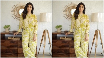 Karishma picked a yellow and white patterned cotton jumpsuit featuring full sleeves and wide legs. (Instagram/@karishmaktanna) Karishma picked a yellow and white patterned cotton jumpsuit featuring full sleeves and wide legs. (Instagram/@karishmaktanna)