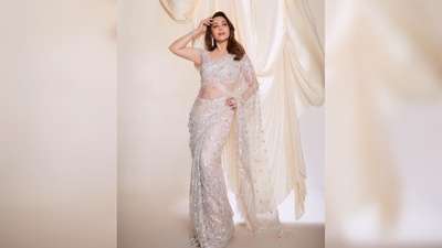 For the latest episode of the show Jhalak Dikhla Jaa Season 10, Madhuri Dixit draped a jaw-dropping sheer ivory embellished saree. (Instagram/@stylebyami) For the latest episode of the show Jhalak Dikhla Jaa Season 10, Madhuri Dixit draped a jaw-dropping sheer ivory embellished saree. (Instagram/@stylebyami)