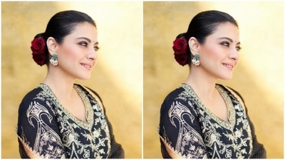 In black and golden juttis and golden earrings, Kajol wore her tresses into a clean bun and added a red rose to give more ethnic vibes to her look. (Instagram/@kajol) In black and golden juttis and golden earrings, Kajol wore her tresses into a clean bun and added a red rose to give more ethnic vibes to her look. (Instagram/@kajol)