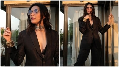 Karishma Tanna is on a spree of making her fans drool with snippets from her fashion diaries. On Saturday, the actor made our weekend better with a slew of pictures of herself decked up as the perfect boss lady. For the pictures, Karishma picked a stunning black ensemble and rocked the look to perfection. Take a look at her pictures here. (Instagram/@karishmaktanna) Karishma Tanna is on a spree of making her fans drool with snippets from her fashion diaries. On Saturday, the actor made our weekend better with a slew of pictures of herself decked up as the perfect boss lady. For the pictures, Karishma picked a stunning black ensemble and rocked the look to perfection. Take a look at her pictures here. (Instagram/@karishmaktanna)