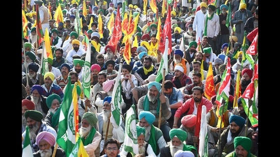 Farmers Heading towards Punjab Raj Bhawan during the Protest march stopped by Chandigarh police at sector 51/52 dividing road of Chandigarh on Saturday. (Ravi Kumar/HT)