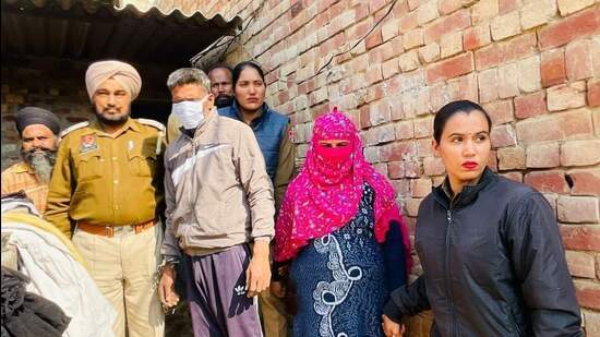 The accused woman and her aide in police custody. (HT photo)